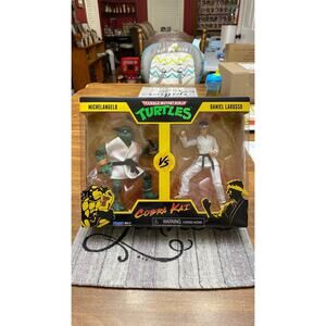 Playmates Toys:  TMNT Michelangelo VS Cobra Kai Daniel Larusso
